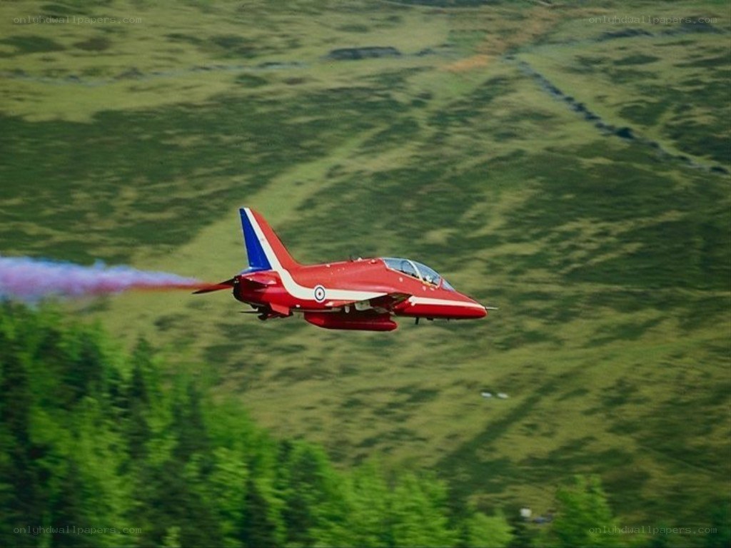 Red Arrows jet in flight