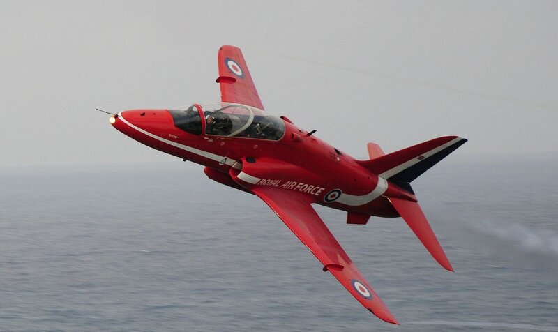 Red Arrows jet in flight