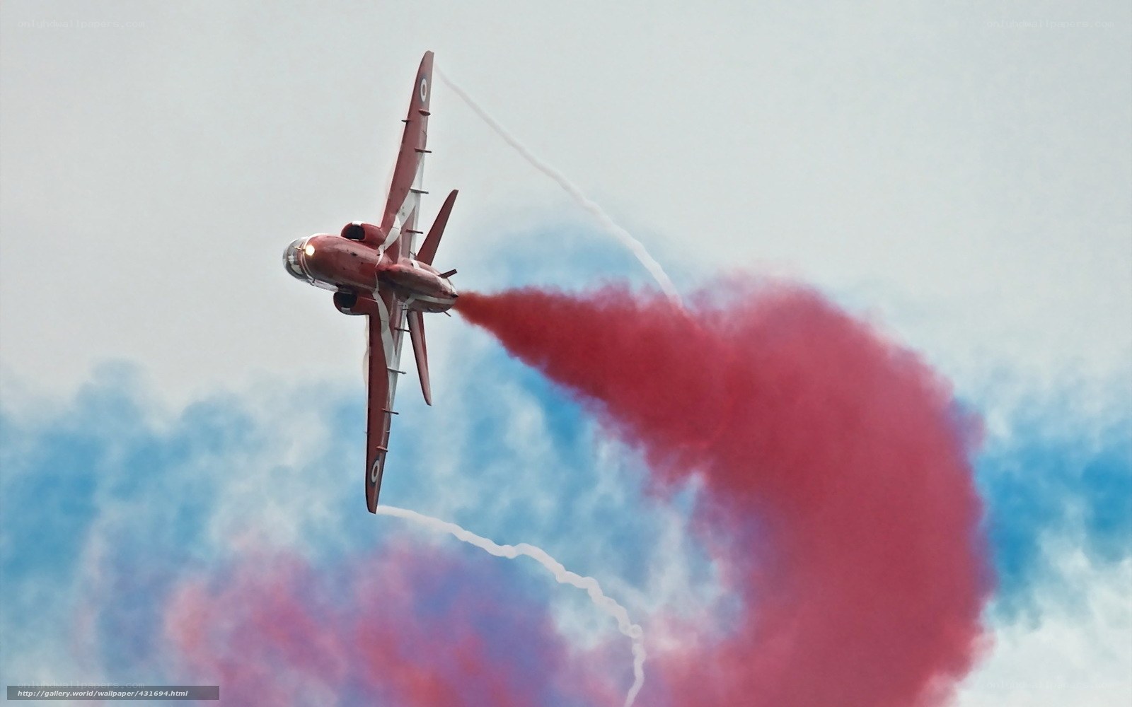 Red Arrows jet in flight