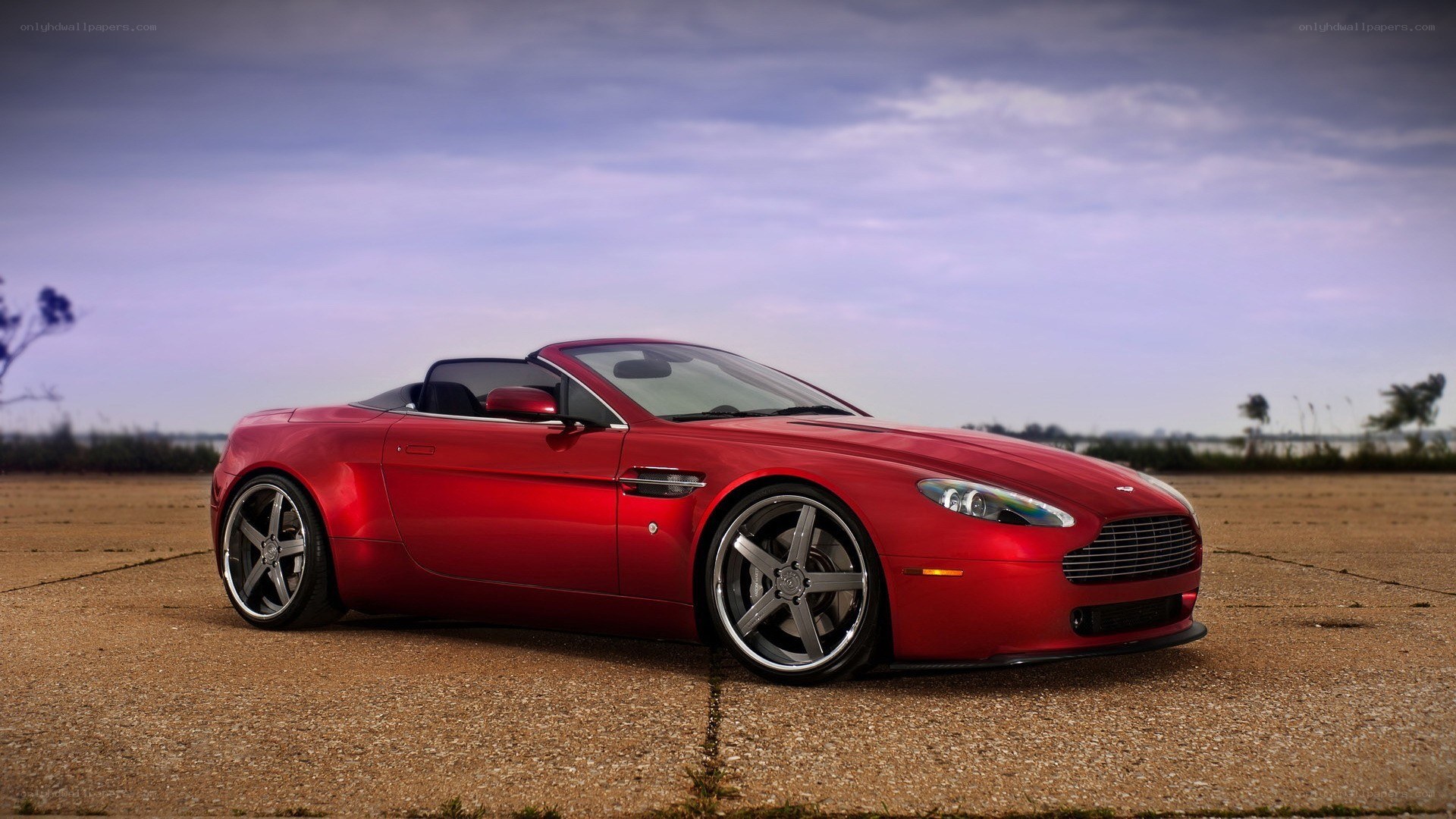 Red Aston Martin convertible