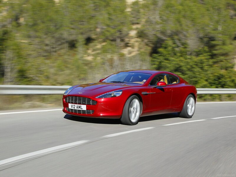 red aston martin on road