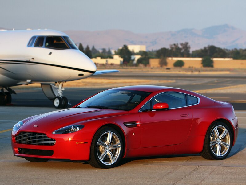 Red Aston Martin on tarmac