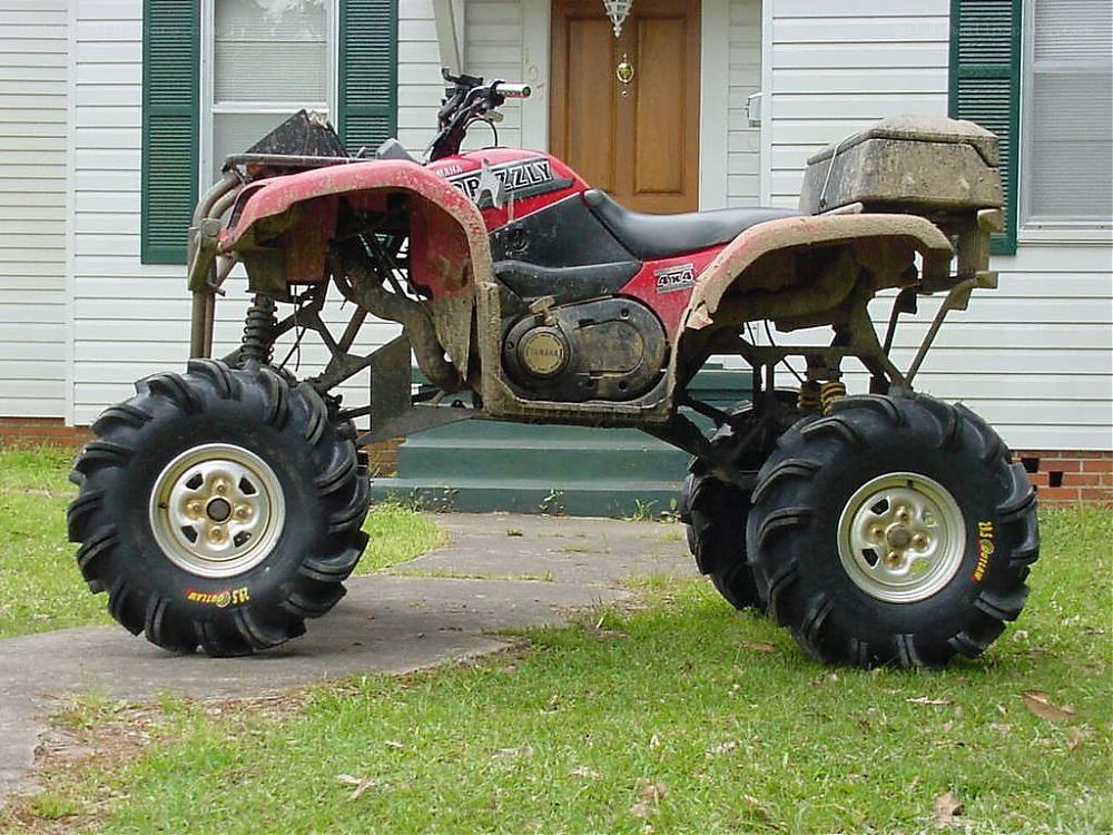 red atv parked outside house