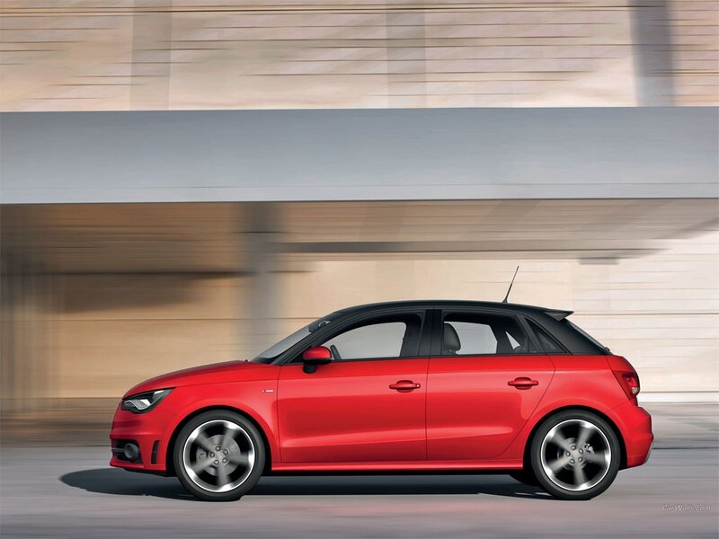 Red Audi A1 in motion