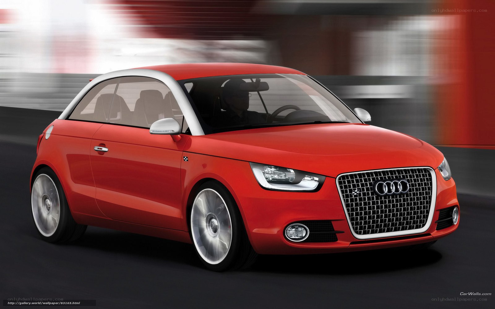 Red Audi A1 in motion