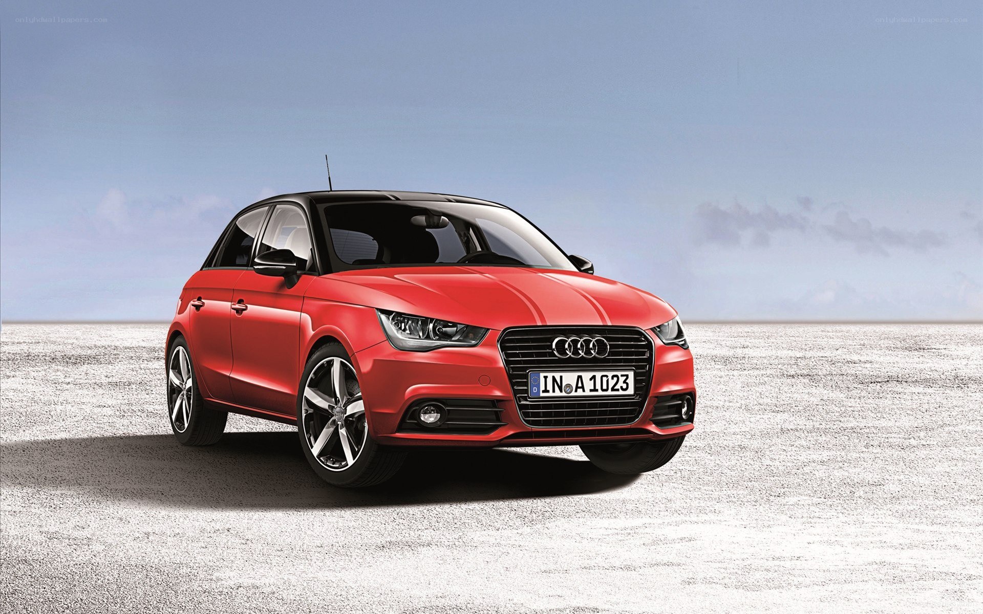 Red Audi A1 on a salt flat