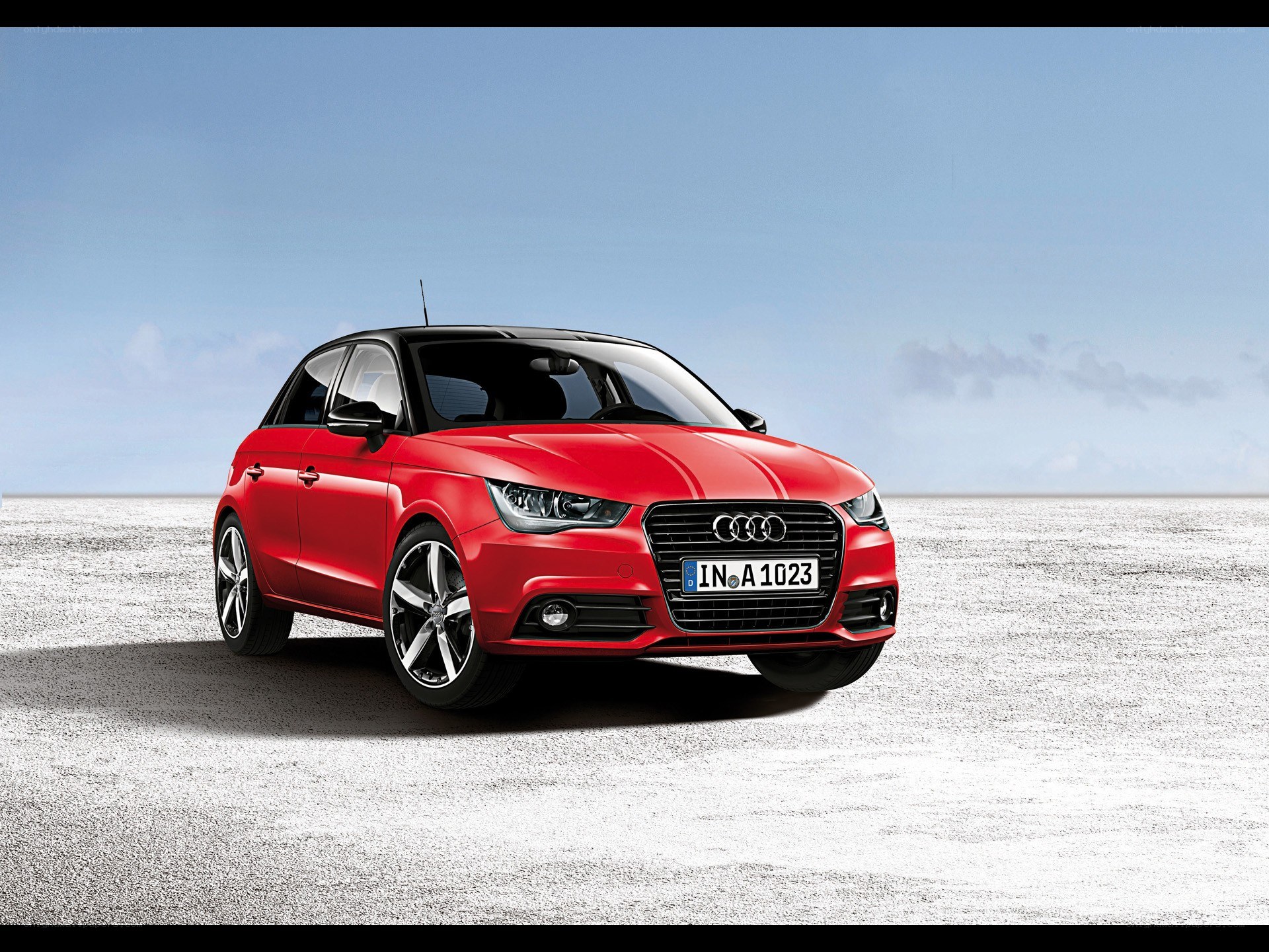 Red Audi A1 on a salt flat
