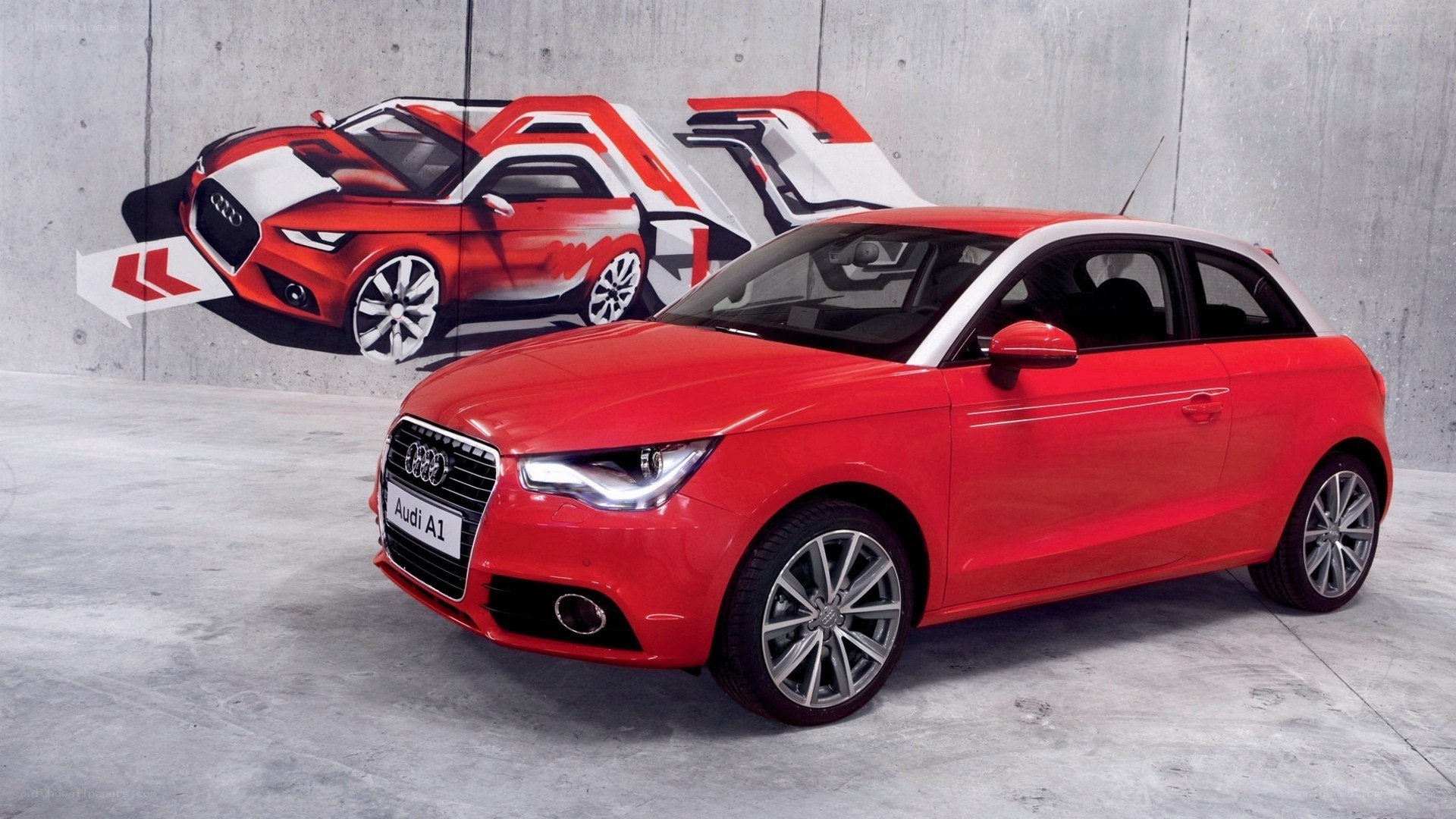 Red Audi A1 with mural