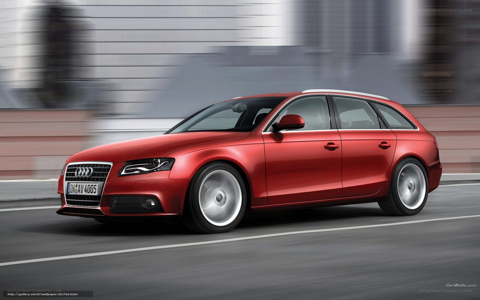 Red Audi A4 Avant in motion