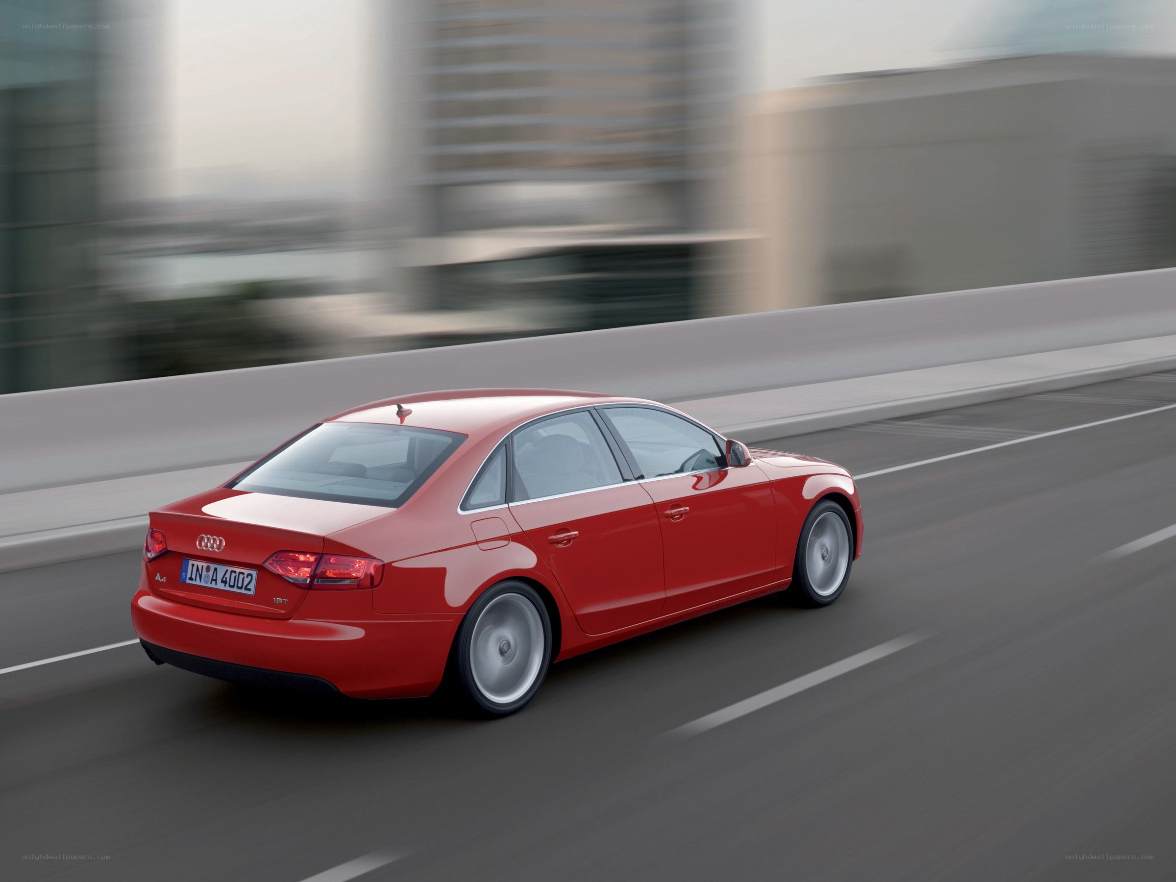 Red Audi A4 in motion