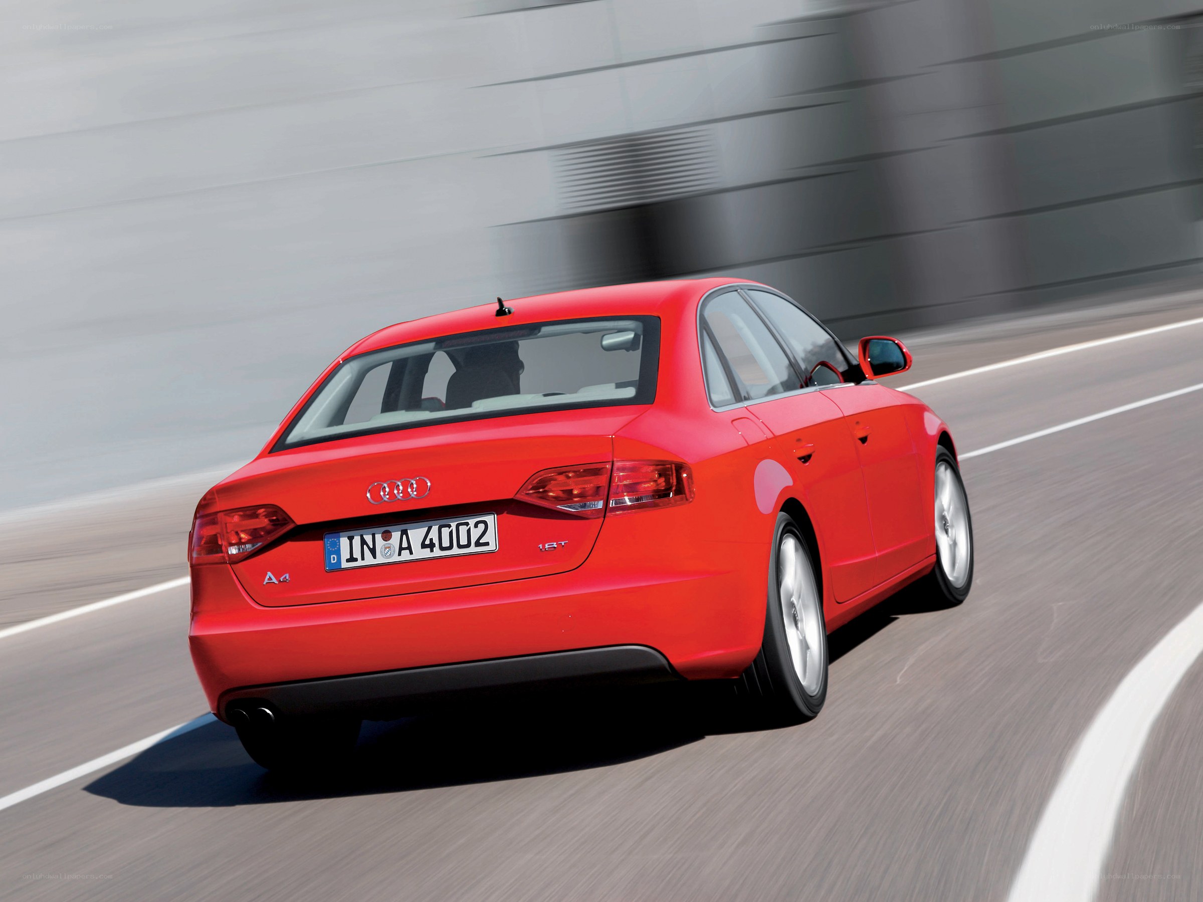 Red Audi A4 in motion