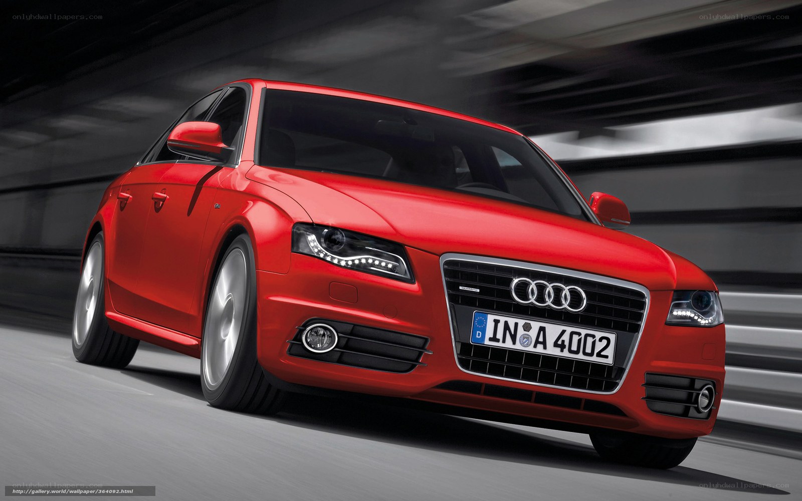 Red Audi A4 in motion