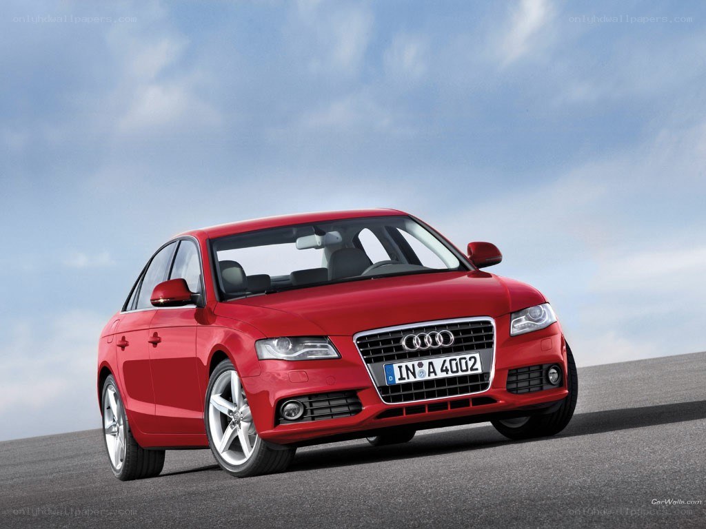 Red Audi A4 on a road