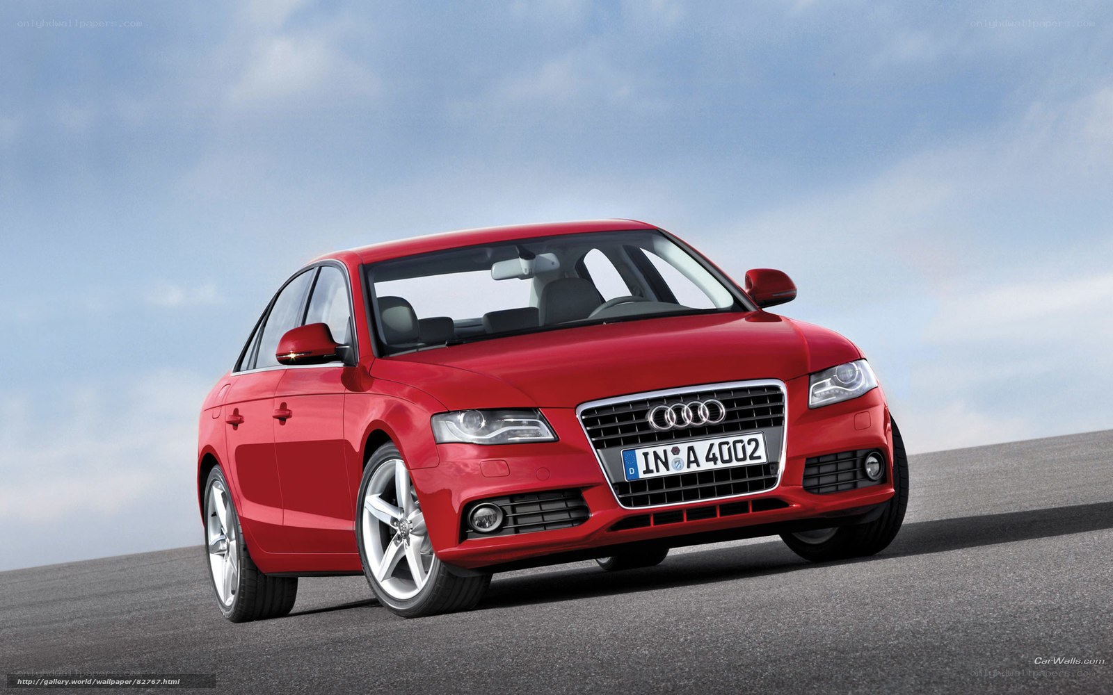 Red Audi A4 on a road