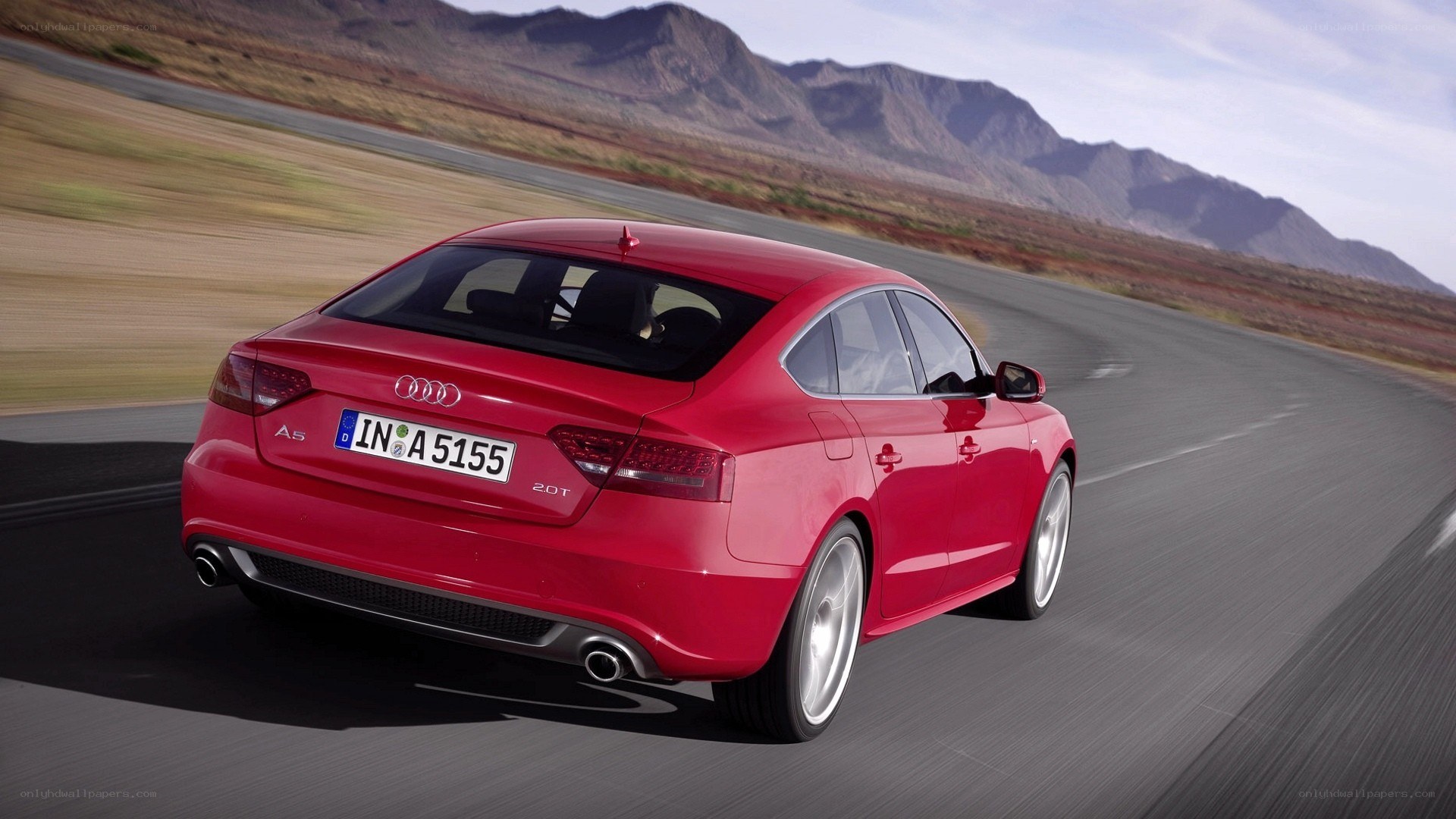 Red Audi A5 in motion