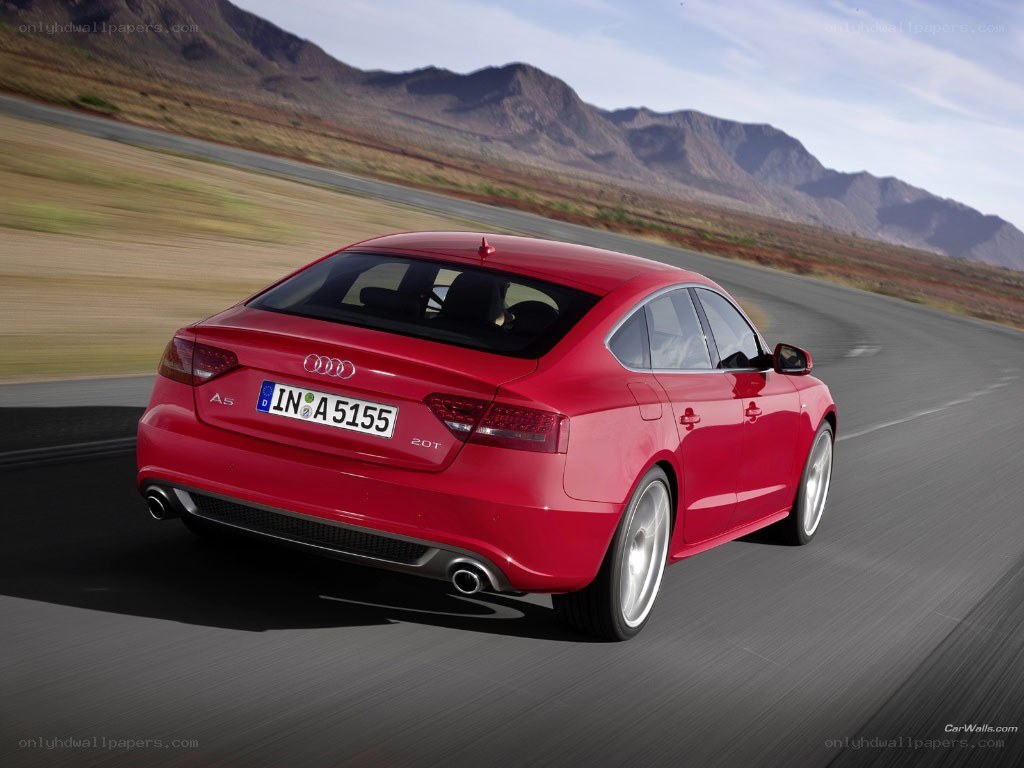 Red Audi A5 in motion