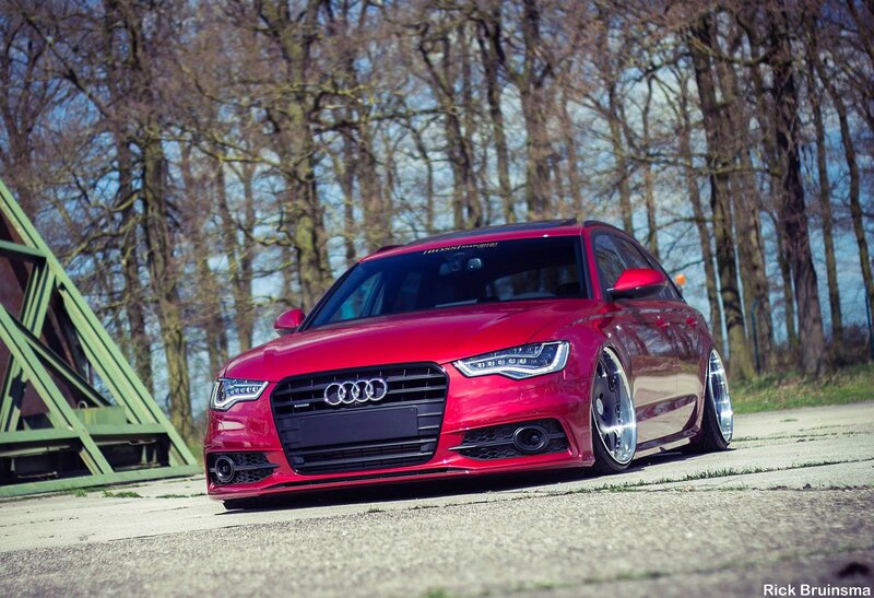 Red Audi A6 on a road