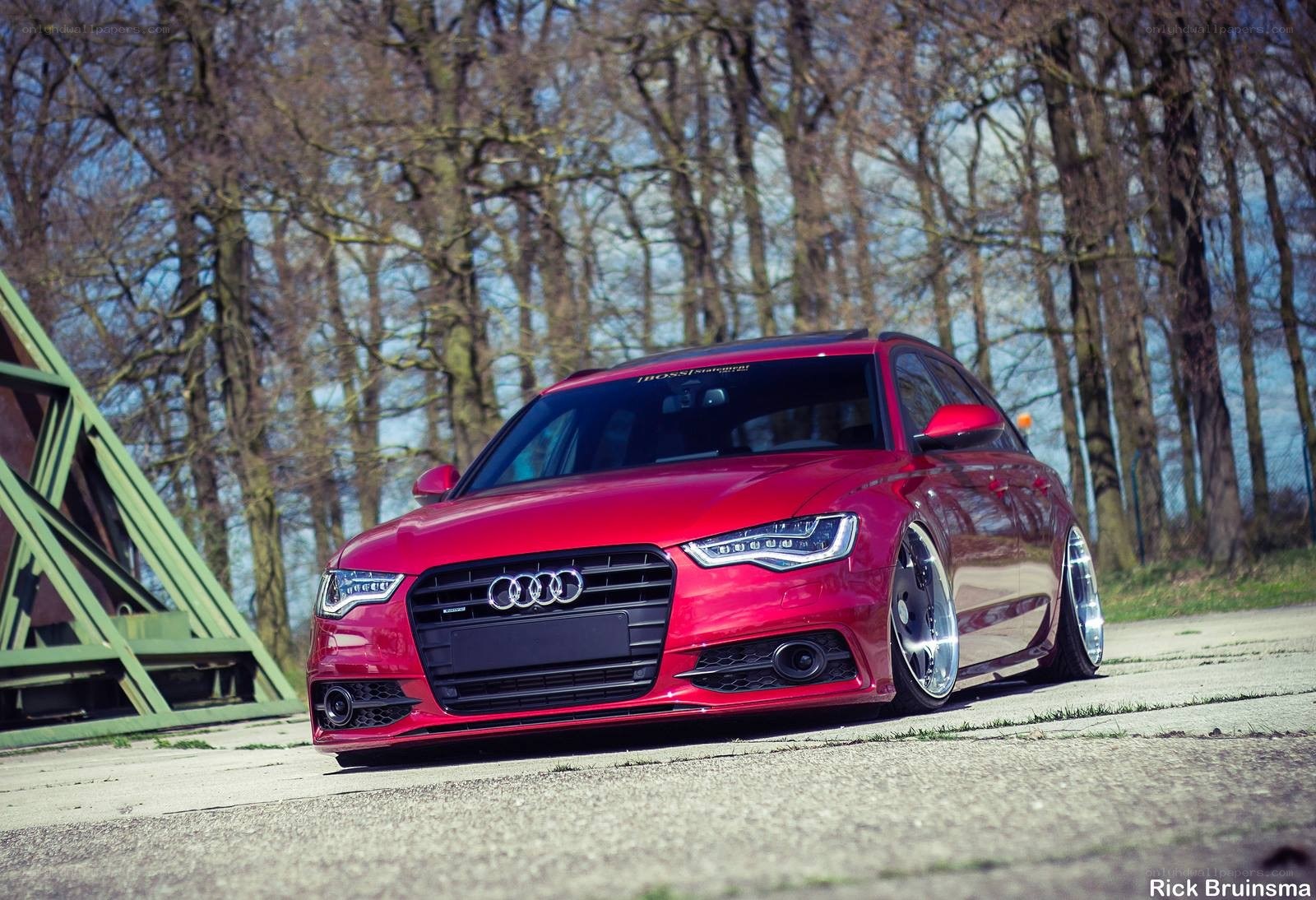 Red Audi A6 on a road