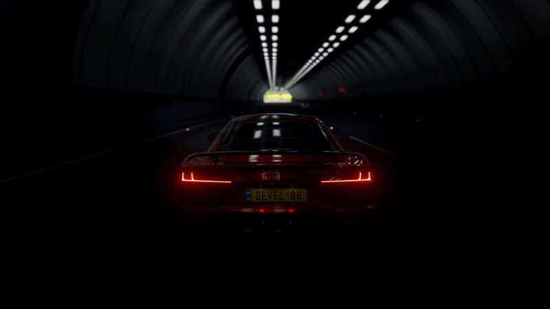 Red Audi Car in Tunnel