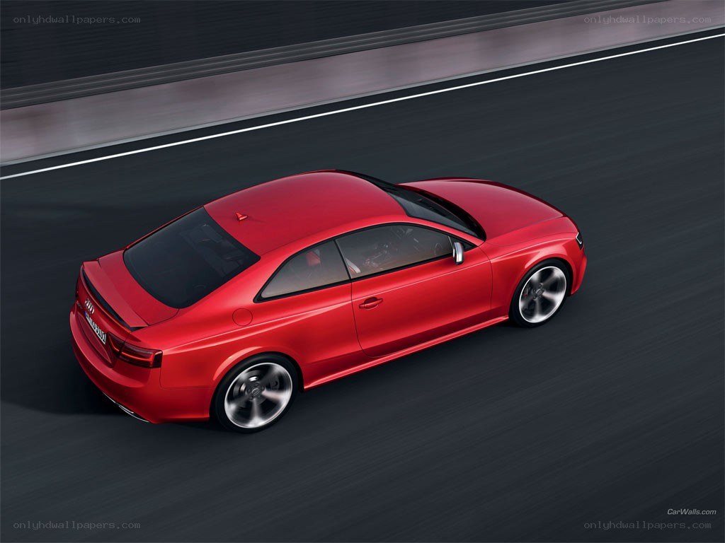 Red Audi coupe in motion