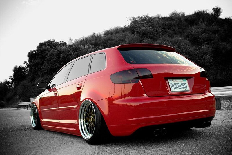 Red Audi Hatchback — Dramatic, Afternoon
