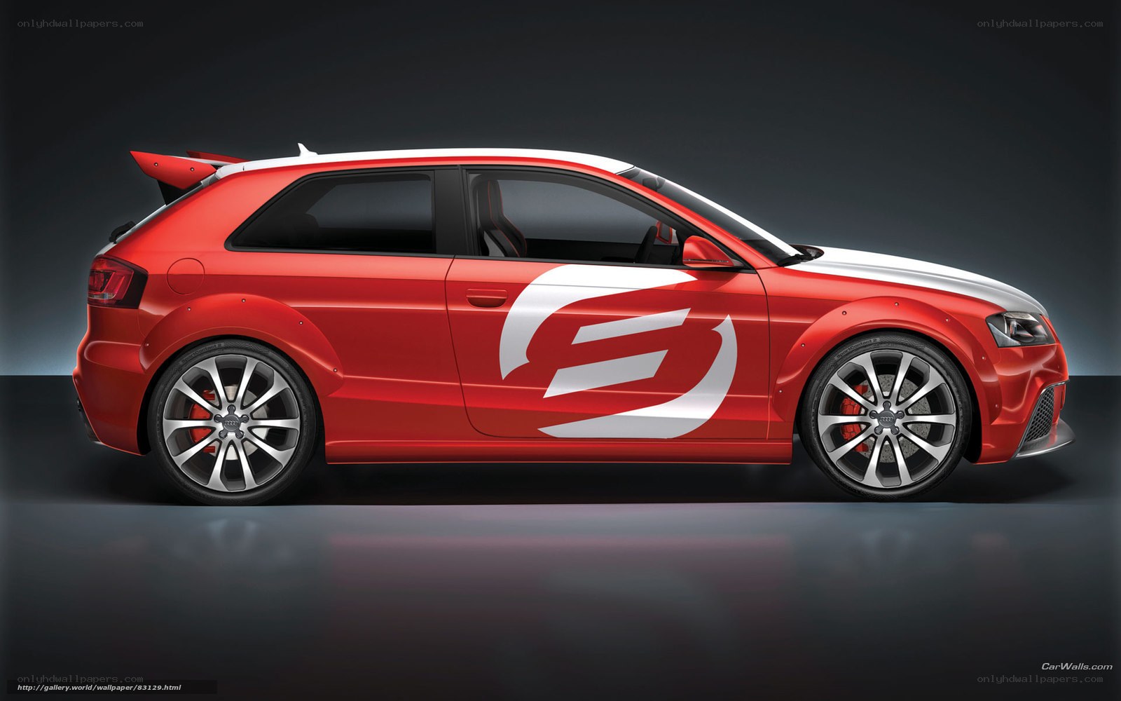 red audi hatchback with custom graphics