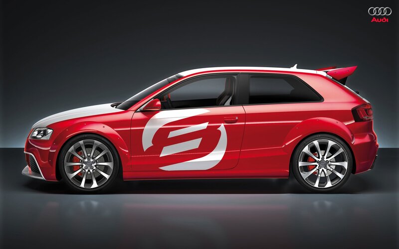 Red Audi hatchback with decals