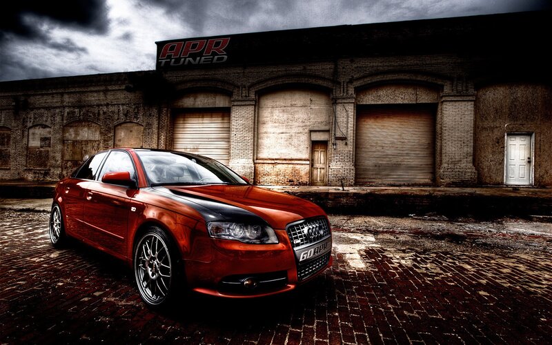 Red Audi in front of APR Tuned building