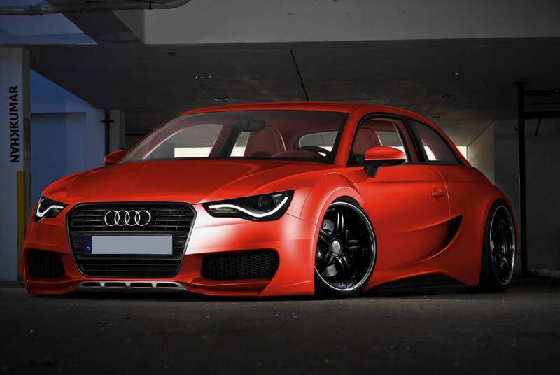 Red Audi in parking garage