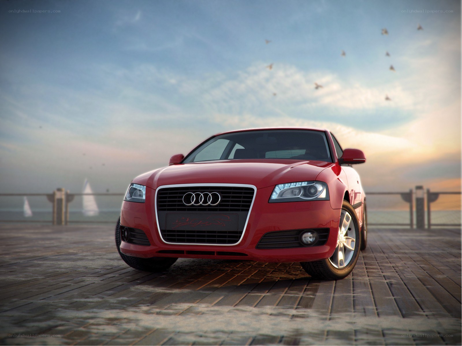 Red Audi on a pier at sunset