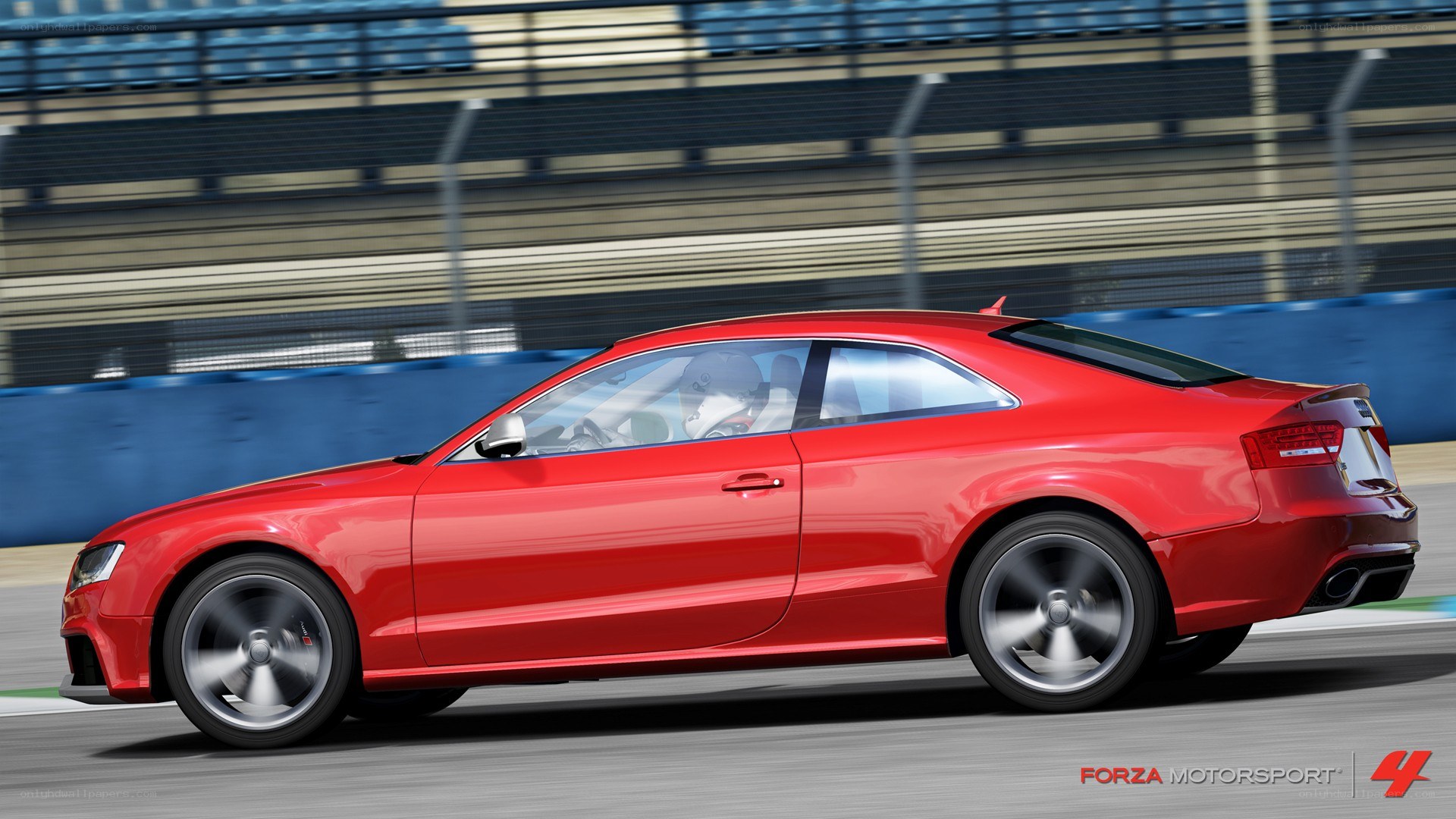 Red Audi on a racetrack