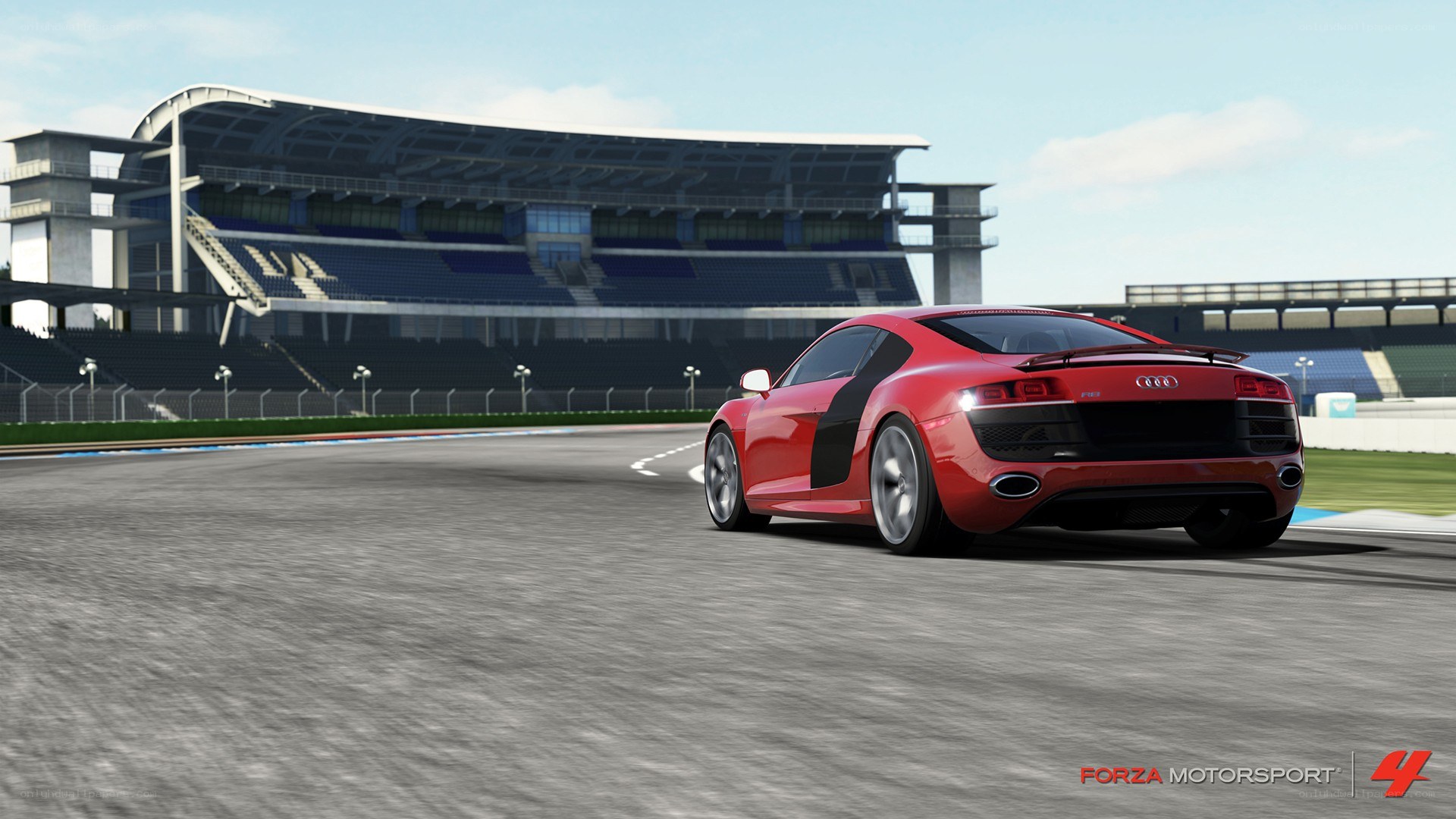 Red Audi on a racetrack