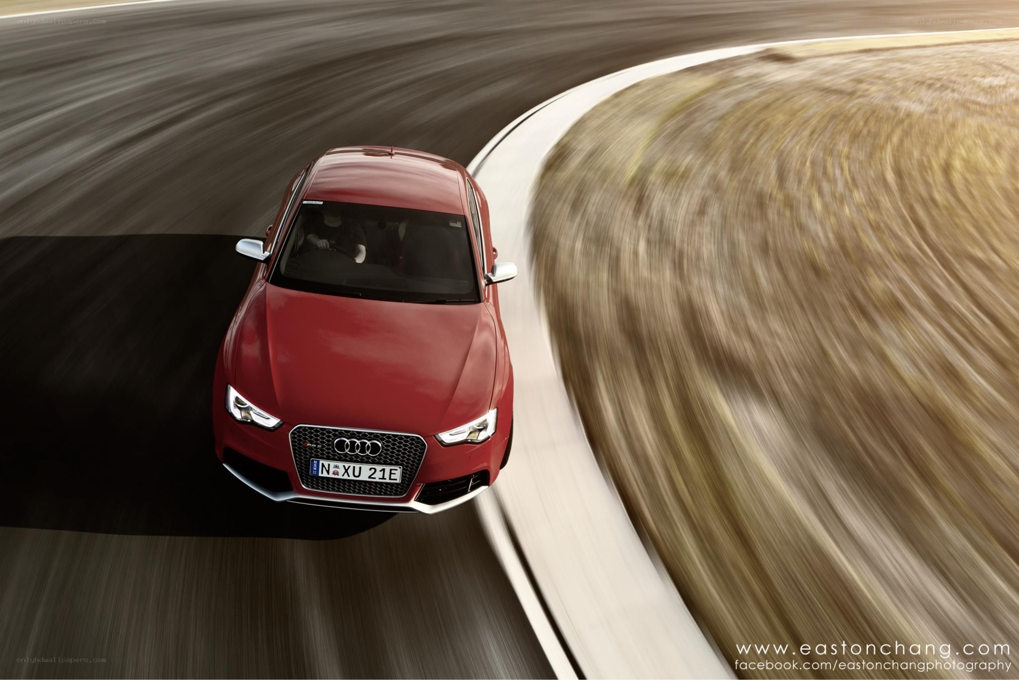 Red Audi on a racetrack