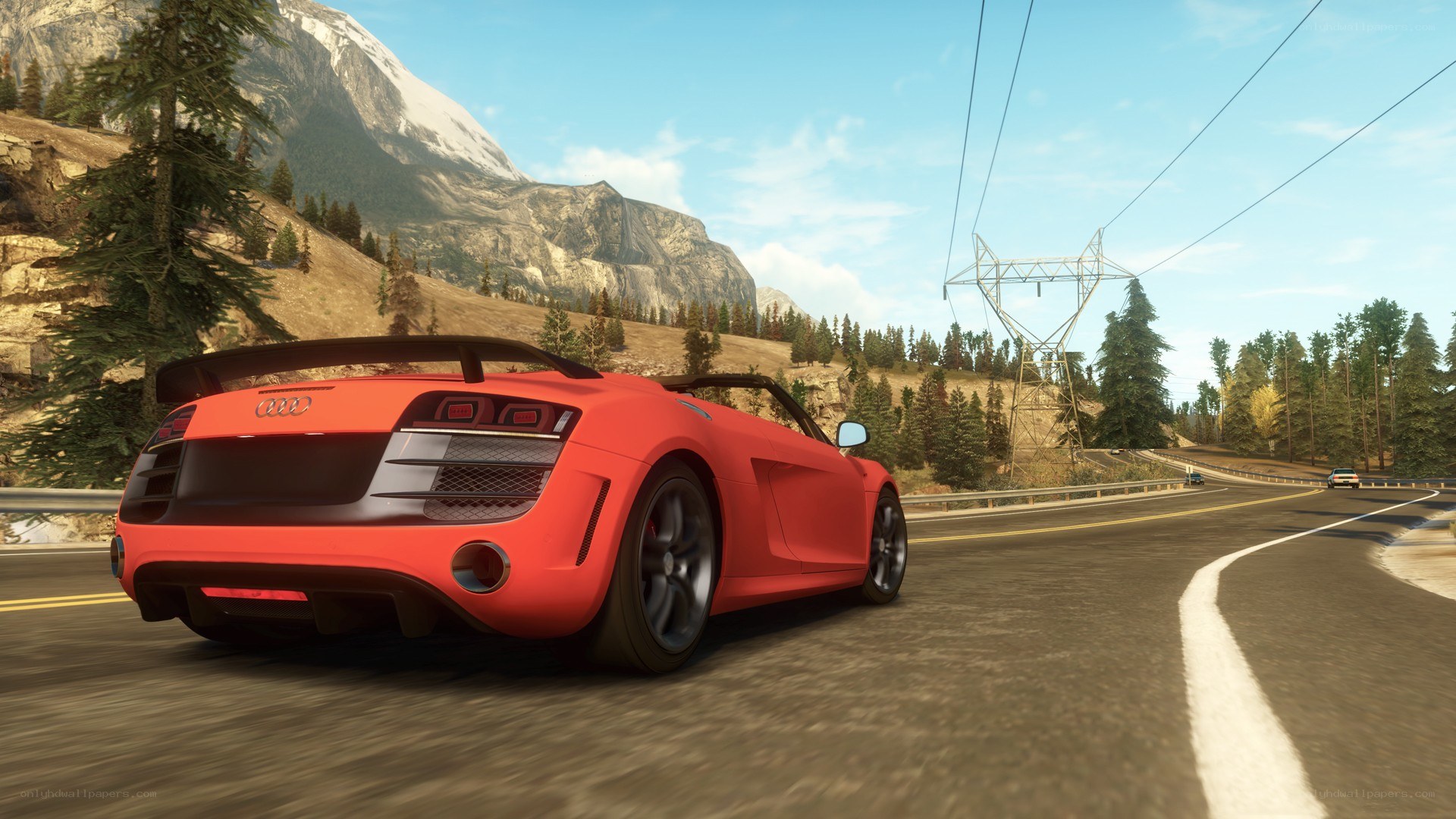 Red Audi on mountain road