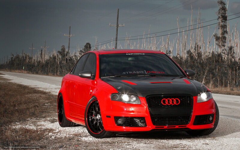 red audi on roadside