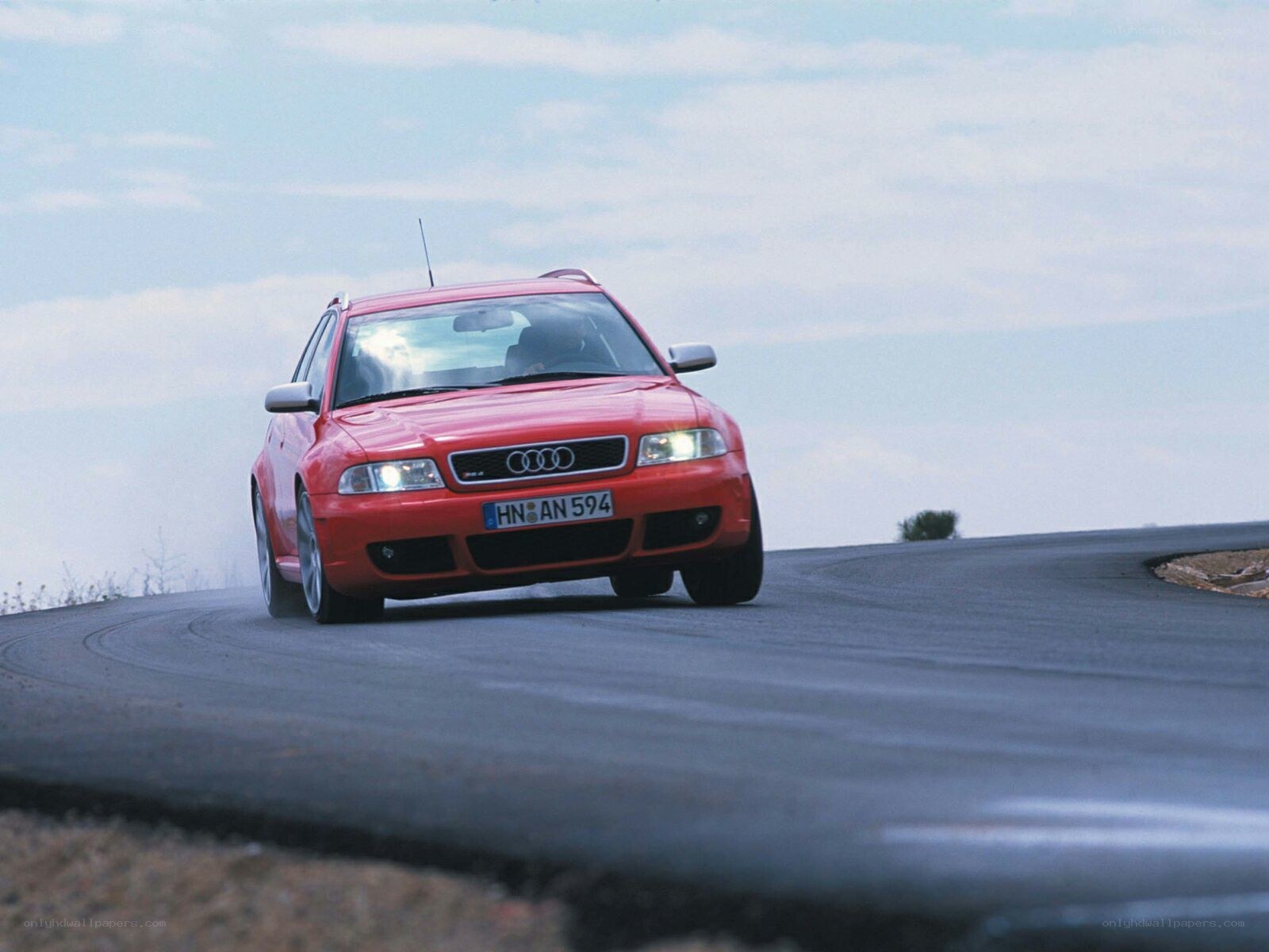 Red Audi on winding road