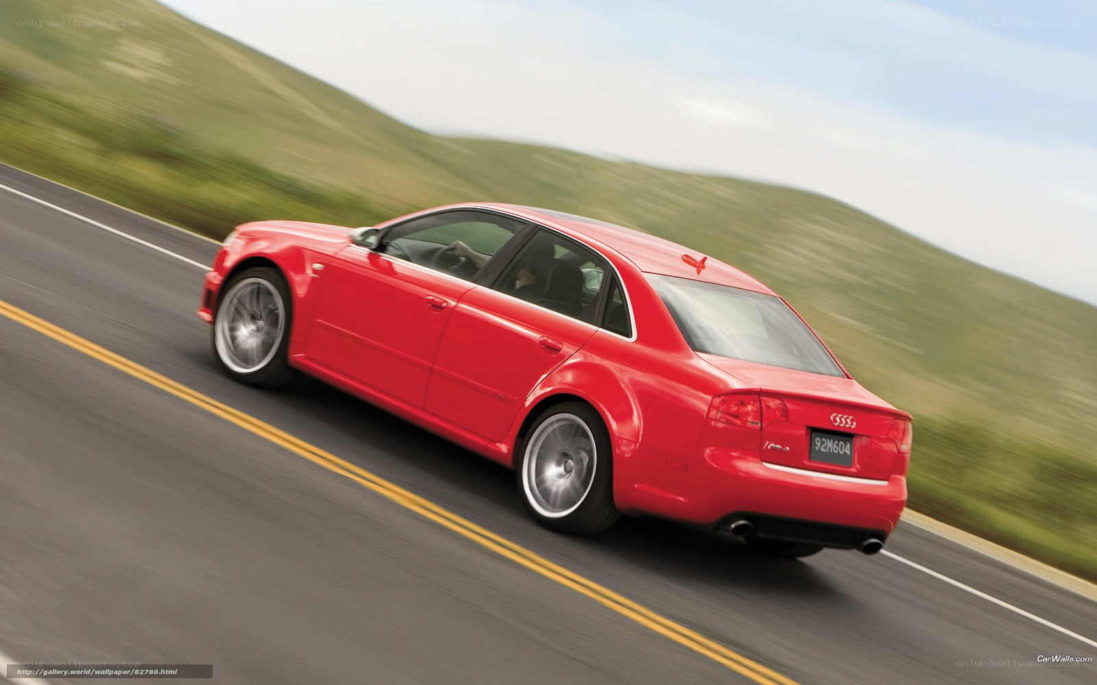 red audi on winding road