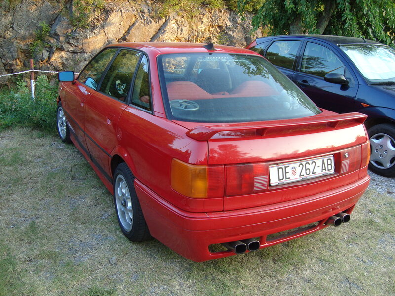 Red Audi parked outdoors