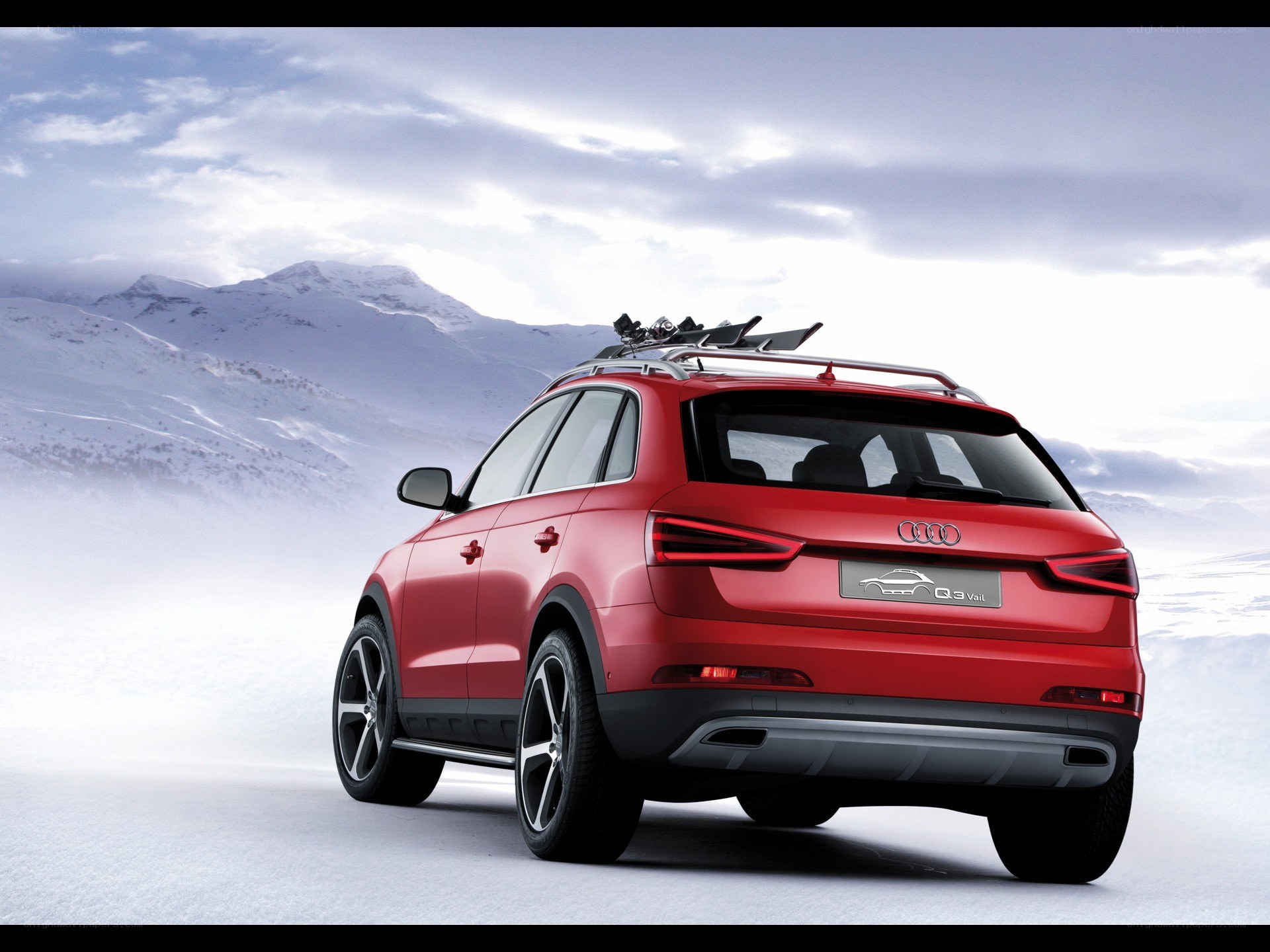 Red Audi Q3 Vail in snow