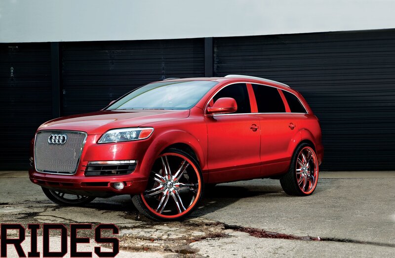 Red Audi Q7 with custom wheels