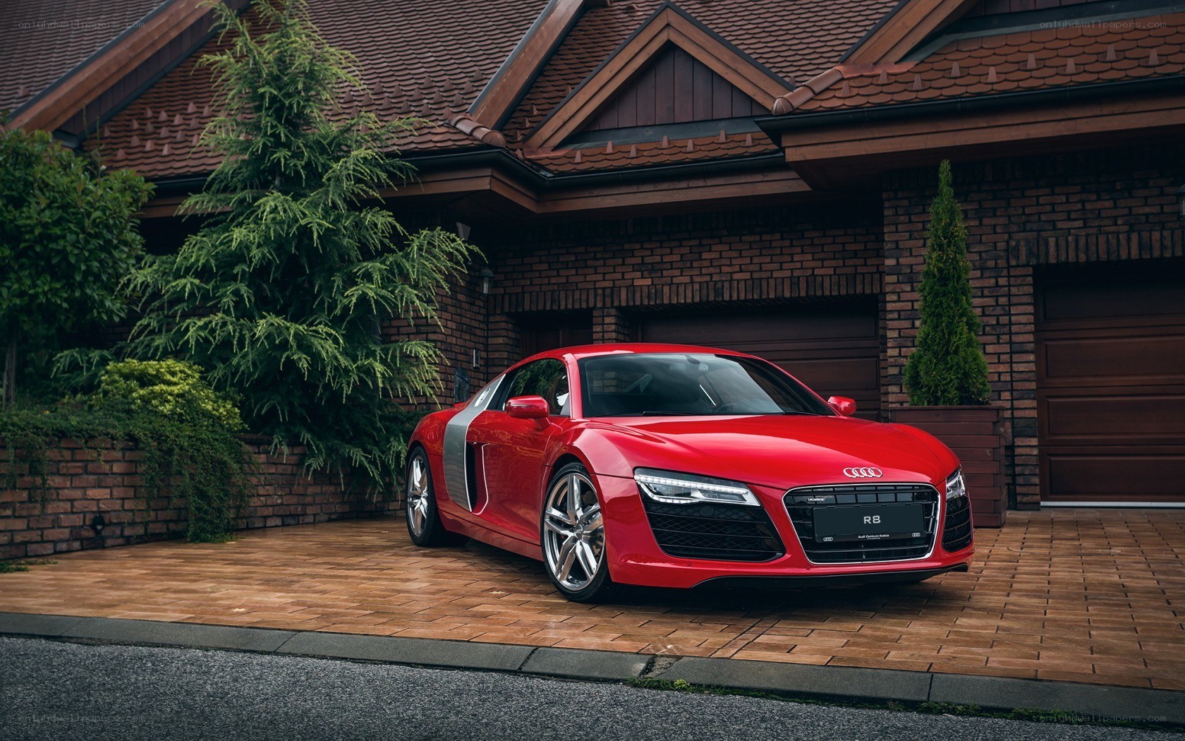 Red Audi R8 in driveway