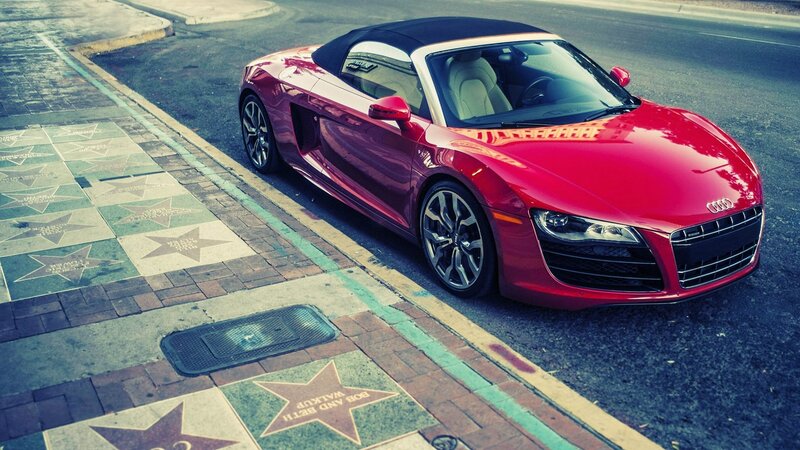 Red Audi R8 on a city street