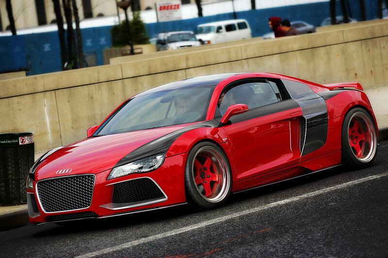 Red Audi R8 on city street