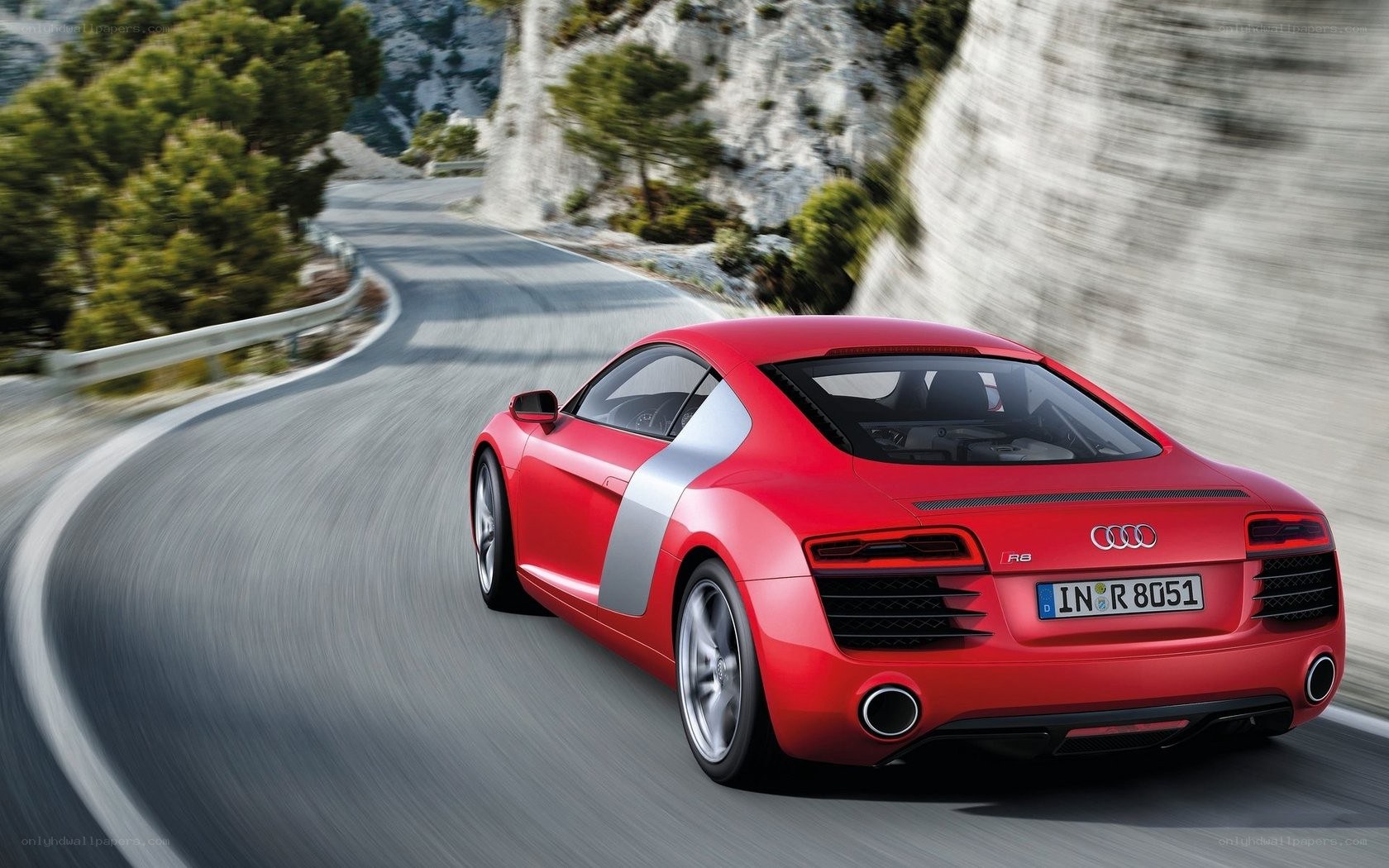 Red Audi R8 on winding road
