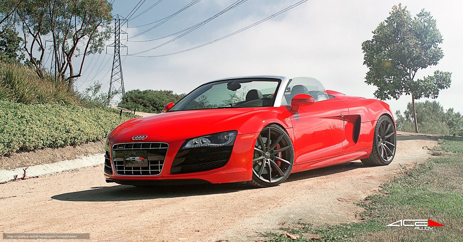 Red Audi R8 Spyder on a road