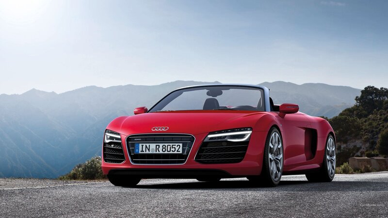 Red Audi R8 Spyder on mountain road