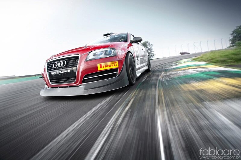 red audi racing on track