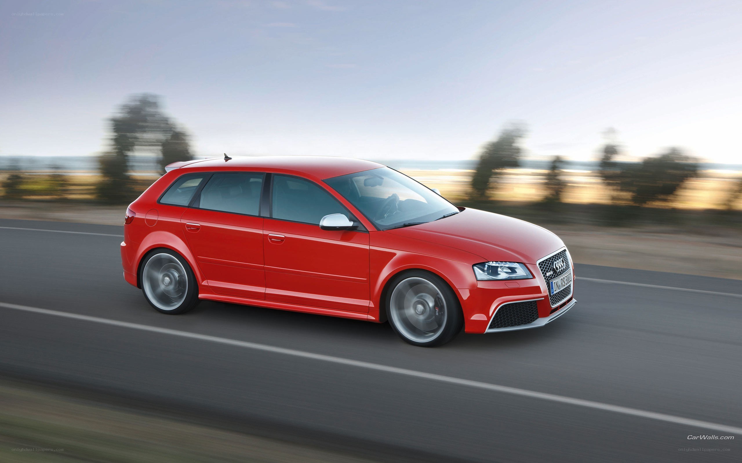 red audi rs3 in motion