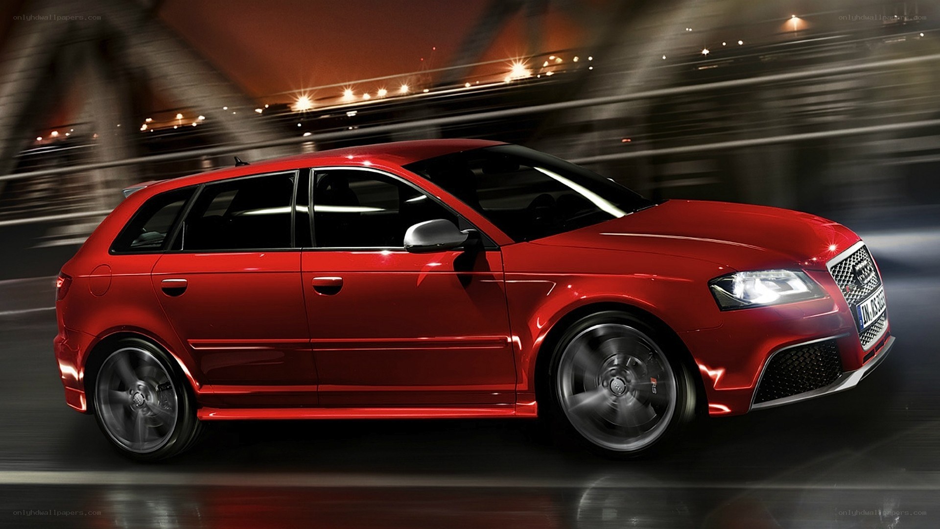 Red Audi RS3 in motion