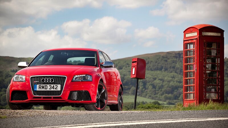 Red Audi RS3 on a country road